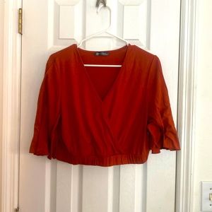Women’s rust colored crop top